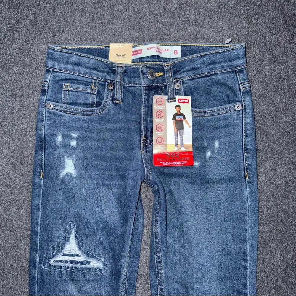NWT Levi’s 502 Regular Taper Jeans Boys 8 (24x25) Medium Wash Stretch Distressed